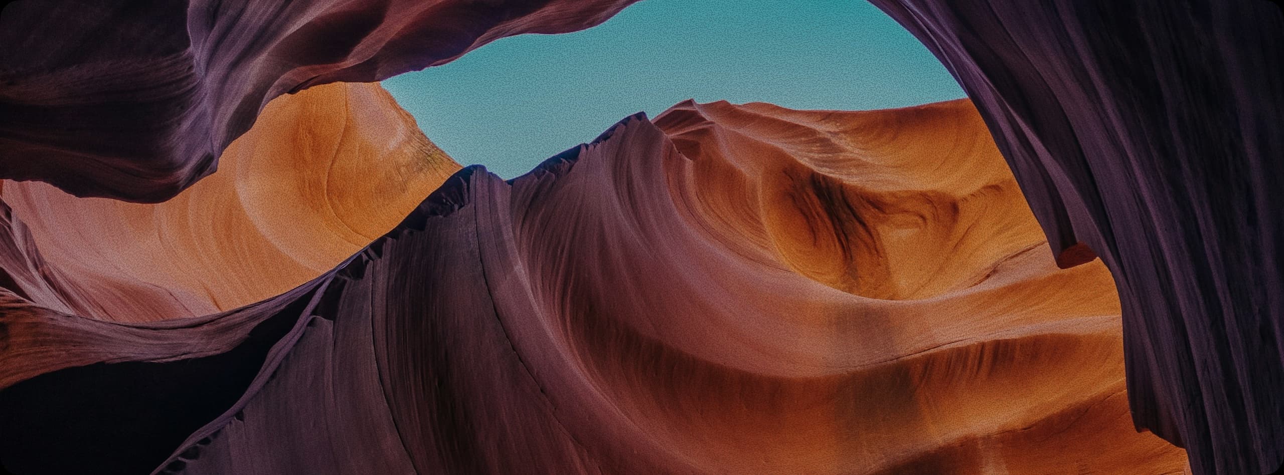 Colorful natural landscape showing smooth slot canyon rock formations